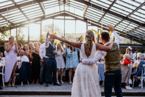 bride and groom first dance in glasshouse at Anan devon