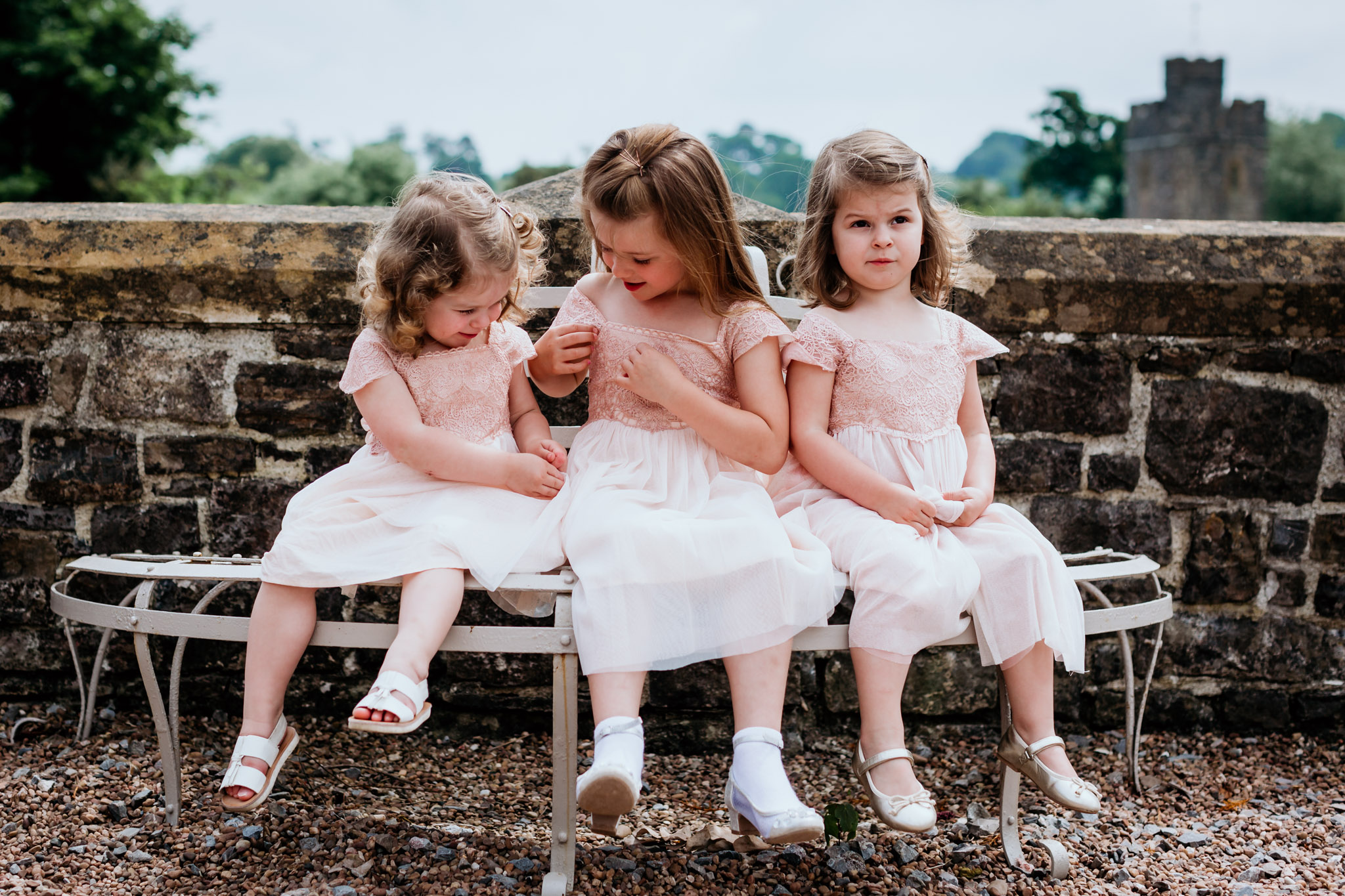 flower girls checking their dresses at huntsham court wedding