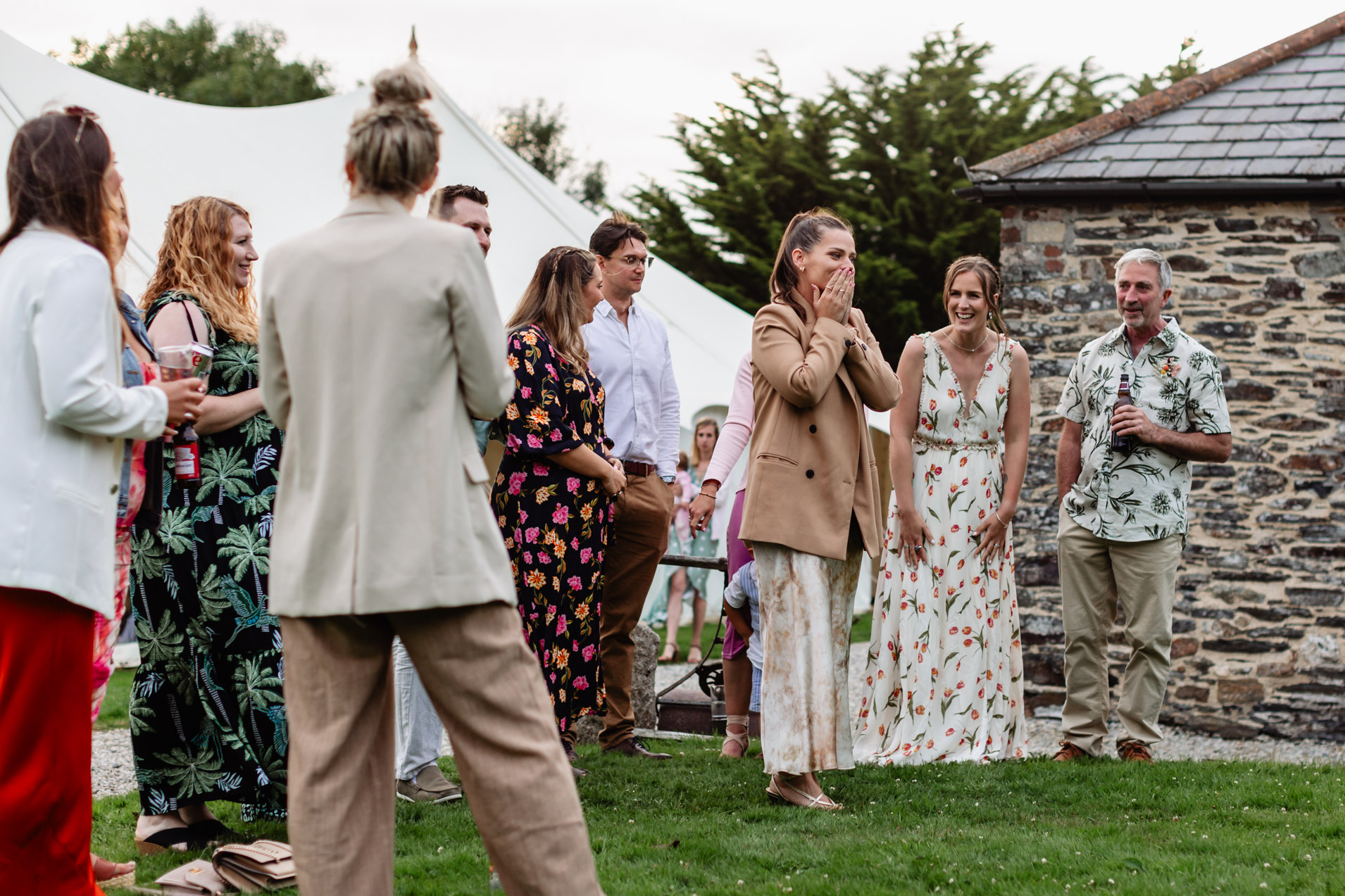 guests having fun with lawn games at wonwood barton wedding