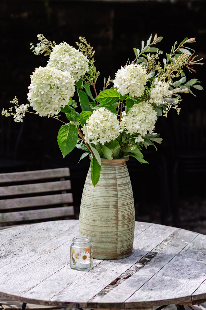 hydrangeas flower vase at natural wedding wonwood barton devon