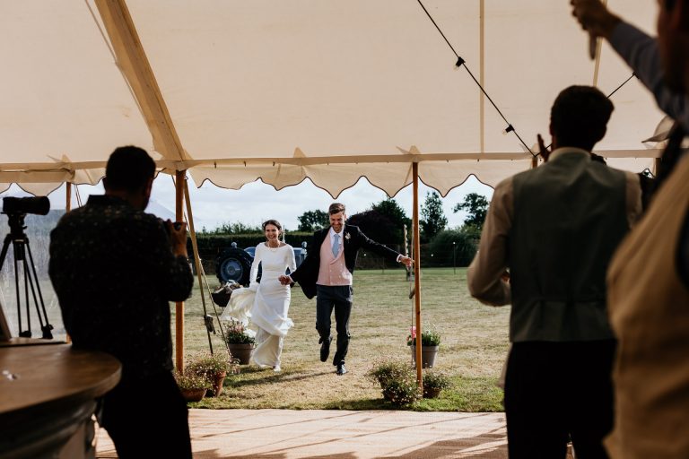 making an entrance into the marquee