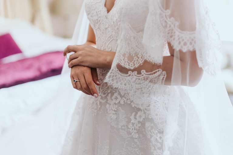 a bride nervously fiddles with her bracelet