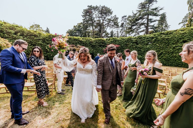 confetti in the circle garden at ashridge great barn